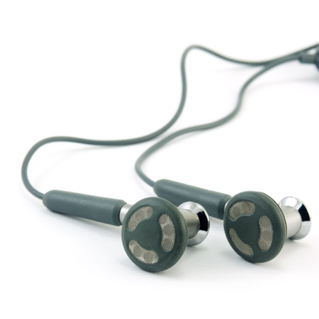 Dark gray headphones isolated on a white square frameの写真素材