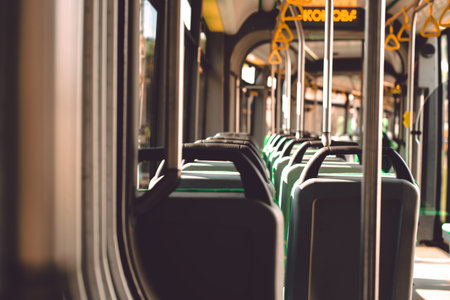 Interior of a Lviv tram with green tram seats