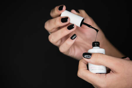black nail paint brushの写真素材
