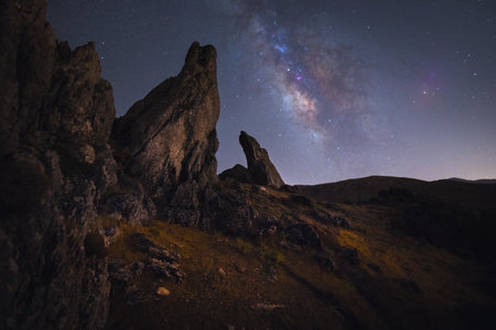 center of the milky way on pointed rocks in a night scapeの写真素材