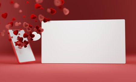 MOBILE PHONE WITH A LIGHTED SCREEN AND MANY RED HEARTS COMING OUT OF IT ON A RED BACKGROUND AND A WHITE SIGN TO PUT TEXT. VALENTINE'S DAY CONCEPTの写真素材