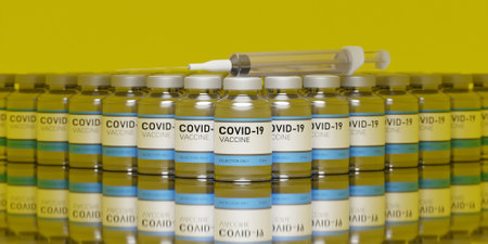 MANY CORONAVIRUS VACCINES LINED UP WITH A SYRINGE ON A GLASS TABLE WITH REFLECTIONS AND A YELLOW BACKGROUNDの写真素材