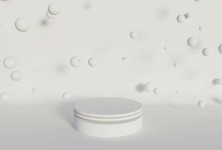 cylindrical product stand with spheres floating around on white background. 3d renderingの写真素材
