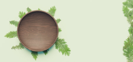 dark wooden plate with pine leaves underneath and on the side of the image on pastel green background. 3d illustrationの写真素材