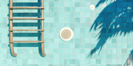 enclosed shot of rusty stairs in an empty blue tiled pool with a spotlight and palm tree shadows. 3d...