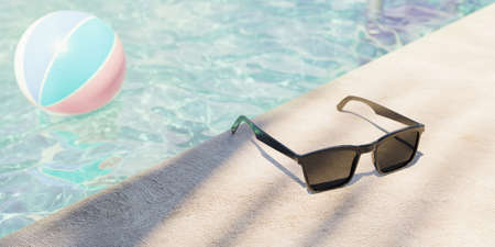Close up of sunglasses on the edge of a pool with water and ball in the background out of focus. 3d...