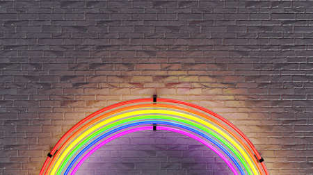 neon rainbow lamp with brick wall in the background. lgbtq + concept, pride day. 3d renderの写真素材
