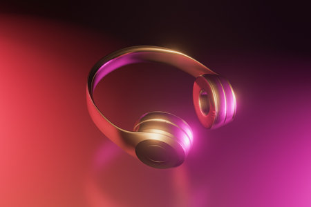 Golden and shiny wireless headphones on black background with reflections. neon lighting. close-up. 3d renderの写真素材