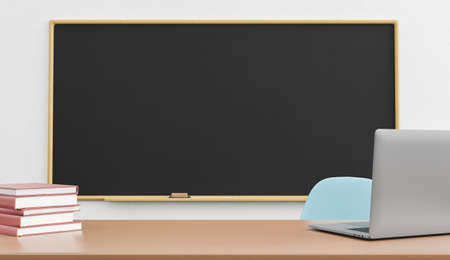 teacher's table with laptop and pile of books and empty chalkboard behind in a classroom. 3d renderの写真素材