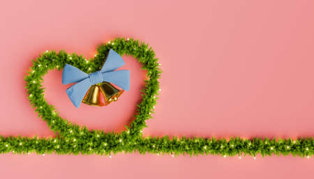 bow of heart-shaped Christmas tree branches decorated with lights and bells. 3d renderingの写真素材