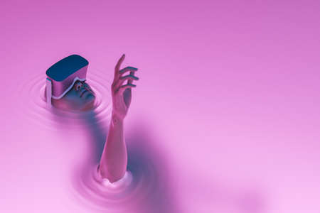 surrealistic scene of a girl with VR glasses immersed in liquid with neon lighting. metaverse concept, nft, creative art and technology. 3d renderingの写真素材