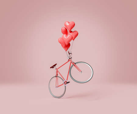 flying bicycle with several heart balloons tied to the handlebars. valentine's day concept,...