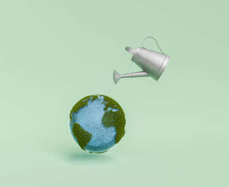 planet earth with a watering can pouring water. global warming concept. 3d renderingの写真素材