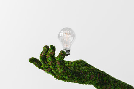 3D rendering of hand of crop unrecognizable person covered with green moss and light bulb against white backgroundの写真素材