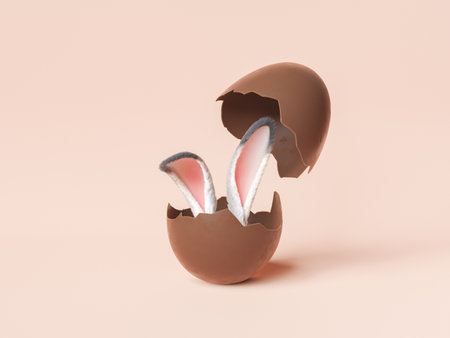 3D rendering of bunny ears in chocolate egg against beige background during Easter holidayの写真素材