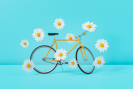 Creative 3D rendering of modern bicycle placed against bright blue background with gentle Bellis perennis flowersの写真素材