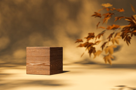 3d rendering of cube shaped wooden side table placed on lighted surface with autumn brown yellow leaves on side against blurred backgroundの写真素材