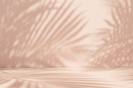3d rendering of soft palm leaf shadows cast upon a textured beige surface. Calm and elegant tropical backdrop.の写真素材