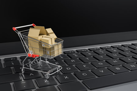 3d rendering of a shopping cart filled with cardboard boxes on a black computer keyboard. Concepts of online shopping integration and logistics.の写真素材