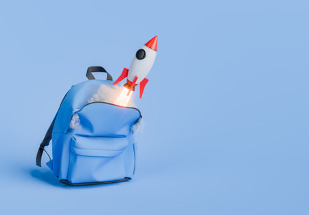 Blue backpack with a rocket launching from inside it on a blue background, symbolizing education and...