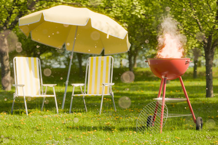 Outdoor barbecue grill with fire next to yellow-striped picnic chairs and an umbrella in a sunny park. Summer picnic concept. 3d renderingの写真素材