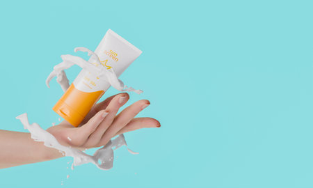 A hand showing a sunscreen tube with SPF 50 surrounded by a splash of lotion against a blue background. Concept of skincare and sun protection. 3d renderingの写真素材