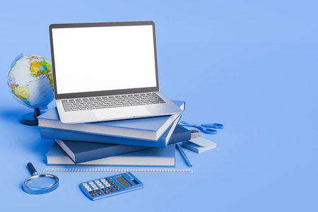 Laptop placed on a stack of blue books with various school supplies like a globe, calculator, and magnifying glass on a blue background. Concept of education and study. 3d rendering.の写真素材