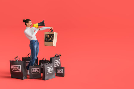 Woman is shouting into a megaphone surrounded by shopping bags on a red background, announcing black friday deals. 3d renderingの写真素材