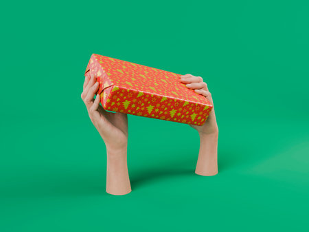 Two hands emerging from a green background holding a Christmas present wrapped in red paper. 3d renderingの写真素材