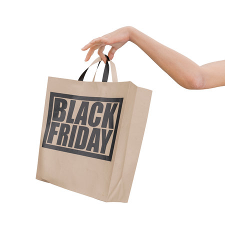 Hand holding shopping bag with black friday text. Transparent background. 3d renderingの写真素材