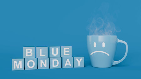 Steaming mug with a sad face next to toy blocks spelling blue monday depicting a feeling of sadness....