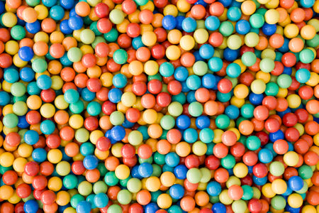 Vibrant multi-colored balls background. Sweets, celebrations or fun themes. 3d rendering