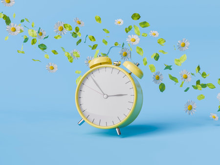Yellow alarm clock surrounded by flying daisies and leaves on a light blue background, celebrating the arrival of spring and the concept of time. 3d renderingの写真素材