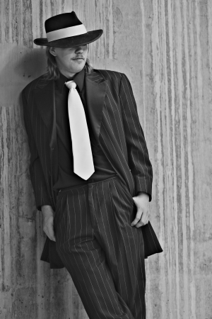 Dapper young man in urban setting wearing zoot suitの写真素材