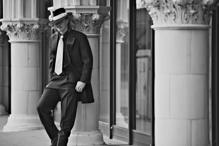 Dapper young man in urban setting wearing zoot suitの写真素材