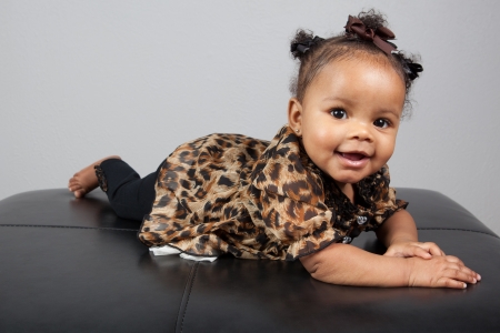 Portrait of beautiful 6 month old African American Babyの写真素材