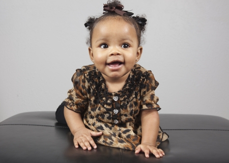 Portrait of beautiful 6 month old African American Babyの写真素材