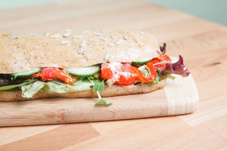 Chicken Salad Sandwich on wooden cutting boardの写真素材