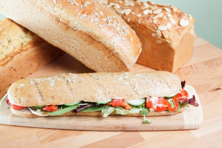 Chicken Salad Sandwich on wooden cutting boardの写真素材