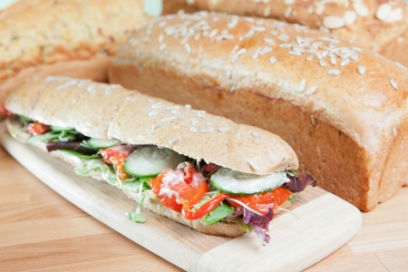 Chicken Salad Sandwich on wooden cutting boardの写真素材