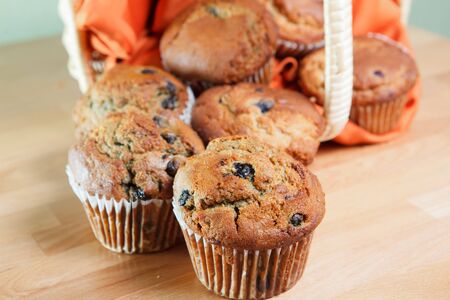 Blueberry Muffins falling out of picnic basketの写真素材