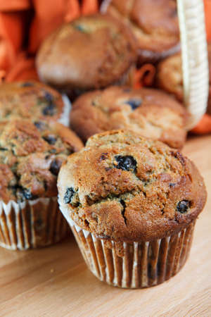 Blueberry Muffins falling out of picnic basketの写真素材