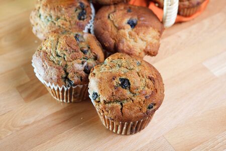 Blueberry Muffins falling out of picnic basketの写真素材