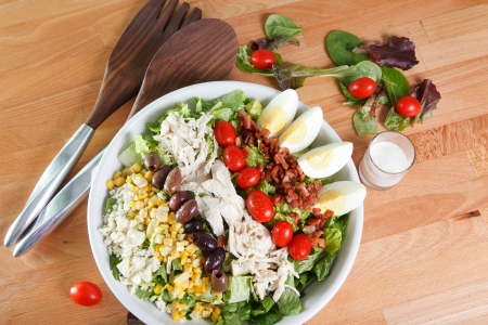 Fresh colorful Cobb Salad and dressingの写真素材