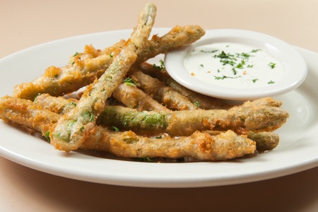 Plate of Deep Fried Asparagus with dipping sauceの写真素材