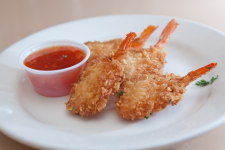 Crispy fried shrimp appetizer with cocktail sauceの写真素材