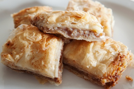 Golden flaky baklava on a plateの写真素材
