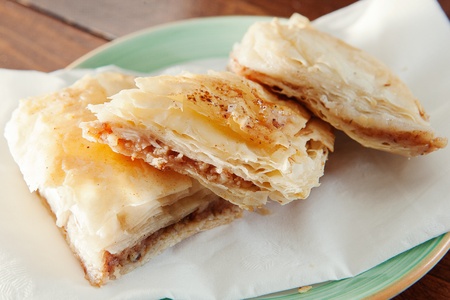 Golden flaky baklava on a plateの写真素材