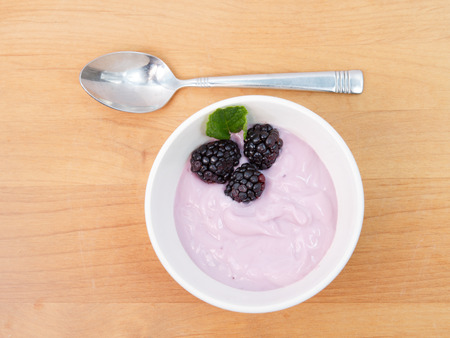 Fruit yogurt with berriesの写真素材