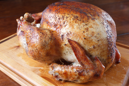 roasted turkey on wood boardの写真素材